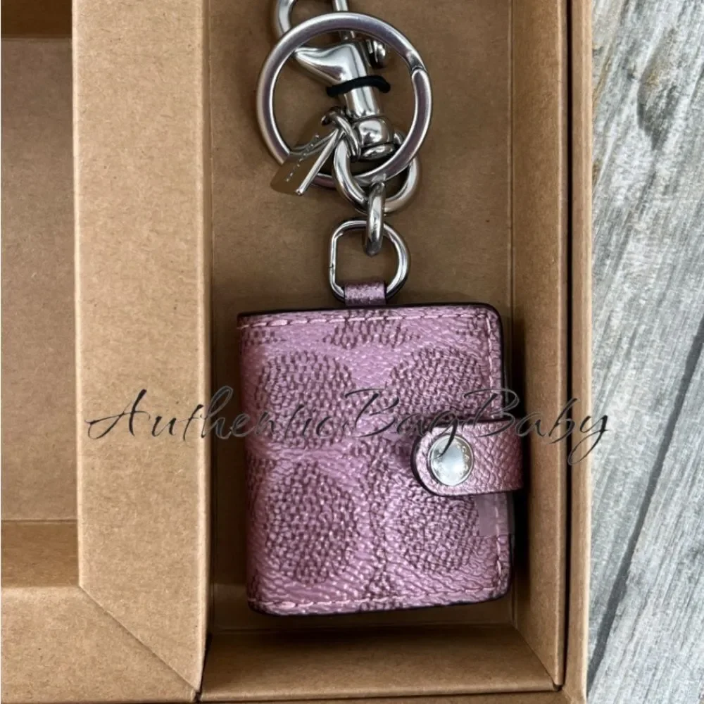 Coach signature coated